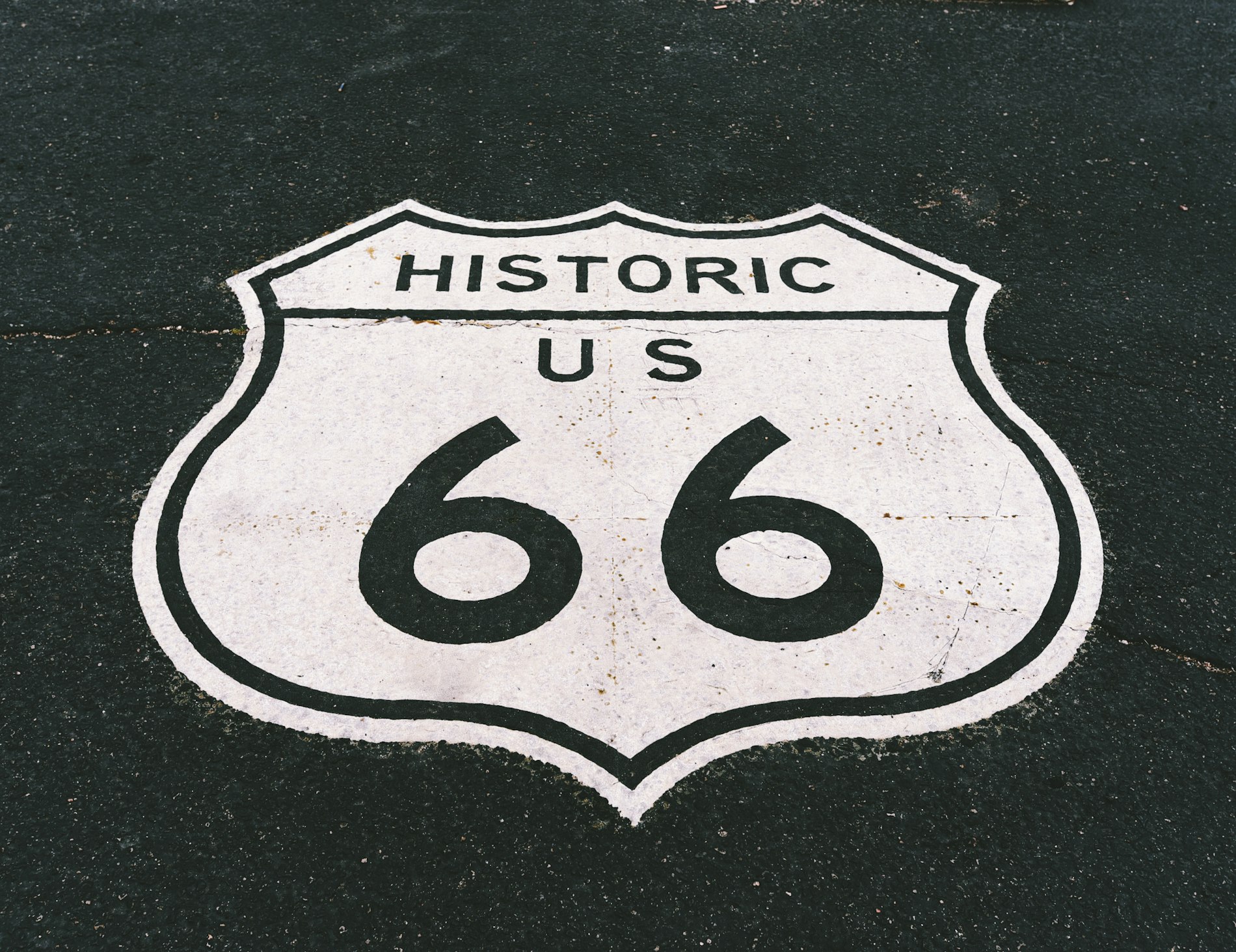 Historic Route 66 shield painted on the roadway near Kingman, Arizona